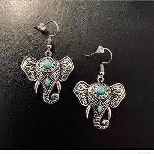 Elephant earrings, pierced, with semi precious stones.
